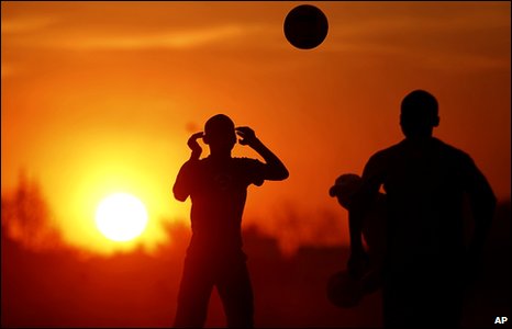 Children Playing Football In Africa