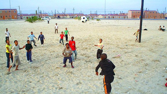 Children Playing Football In Africa